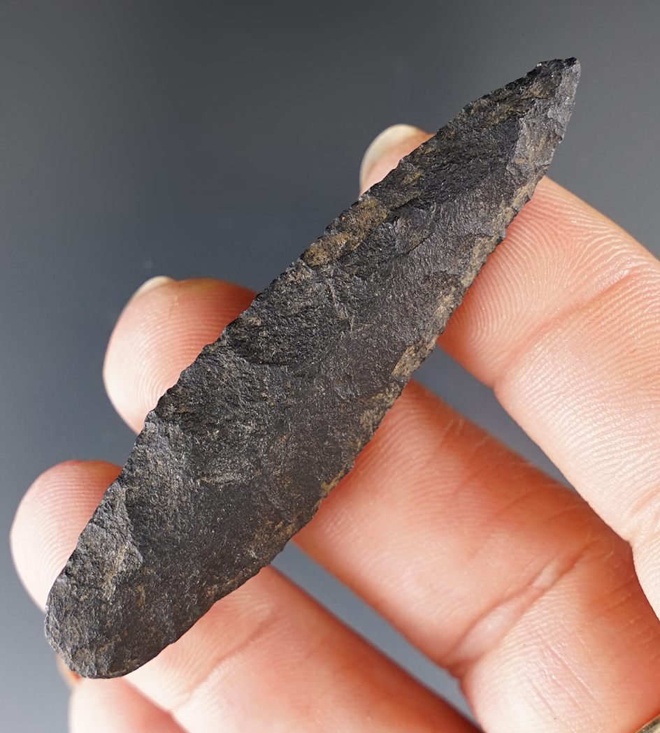 Well made 2 1/2" Inuit point found in Alaska and made from nicely patinated flint.