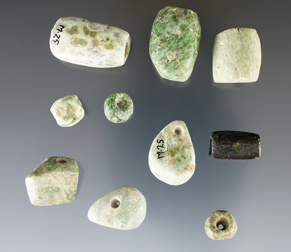 Set of 10 Drilled Pre-Columbian Beads that are well patinated. The largest is 1".