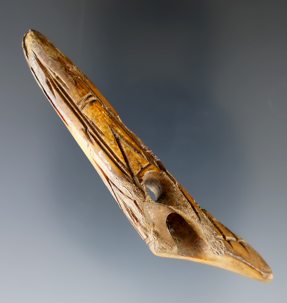 Heavily engraved 3 9/16" Inuit ivory harpoon toggle recovered in Alaska.