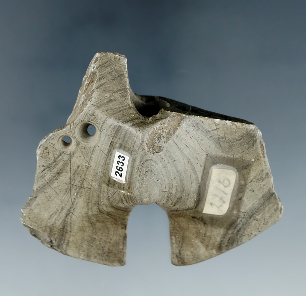 2 13/16" double  notched wing Bannerstone which was drilled for repair in ancient times. Found in Oh