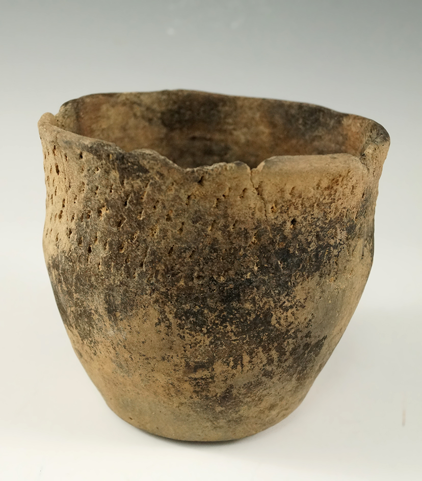 3 1/2" tall by 4" wide pottery vessel found by Bob Hill during a pond excavation in 1963. AR.