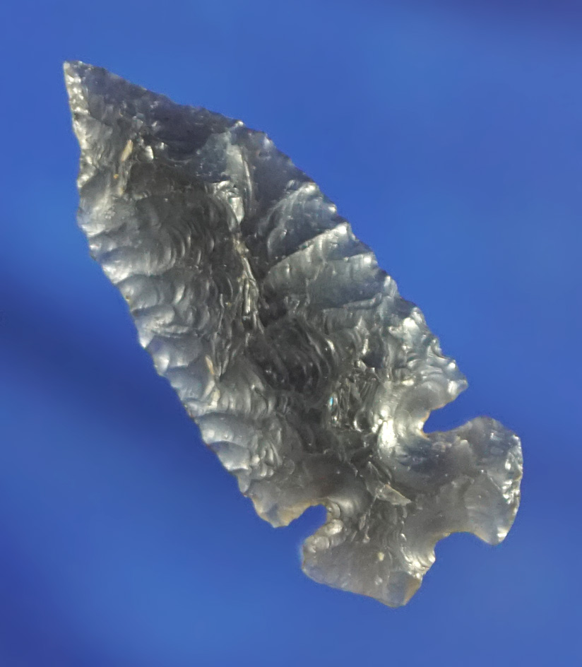 Excellent style on this 1 1/4" thin and well flaked Pentagonal Sidenotch  point found in Nevada.