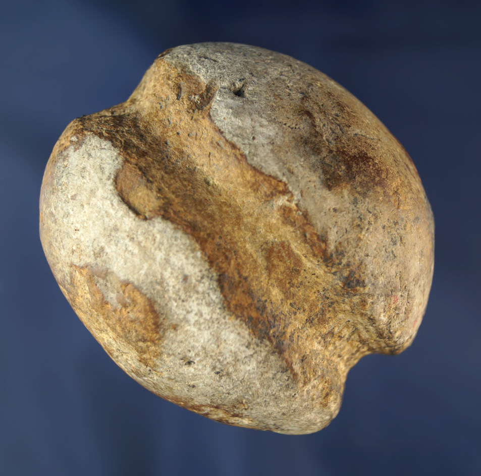 3" historic era grooved stone clubhead found in Illinois. Pictured in Who's Who #9, page 88.
