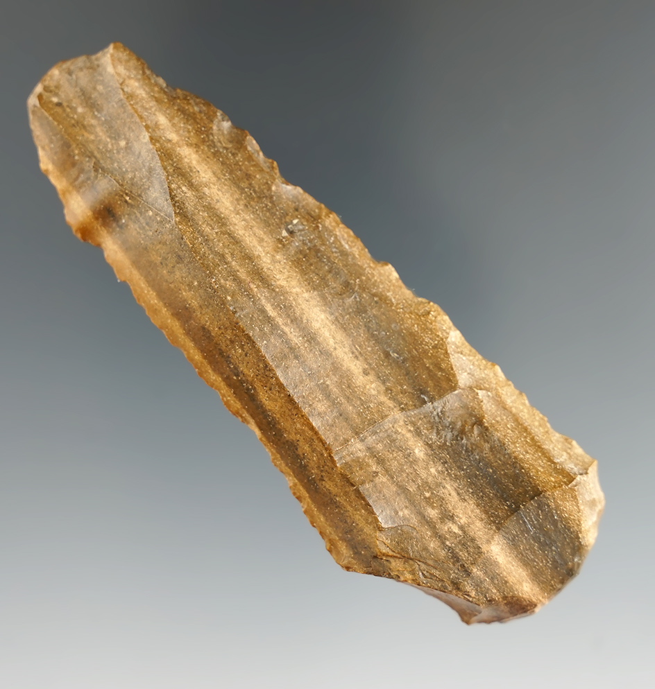 Beautiful material on this well styled 3 5/8" Petrified Wood Scraper found in Texas.