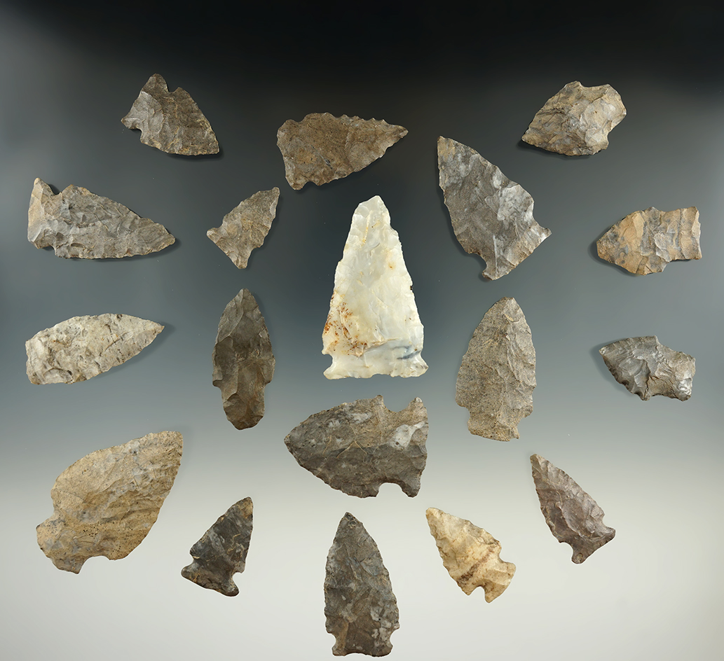 Group of 18 assorted points found in New York, one small stem point has rechipping to the edge.