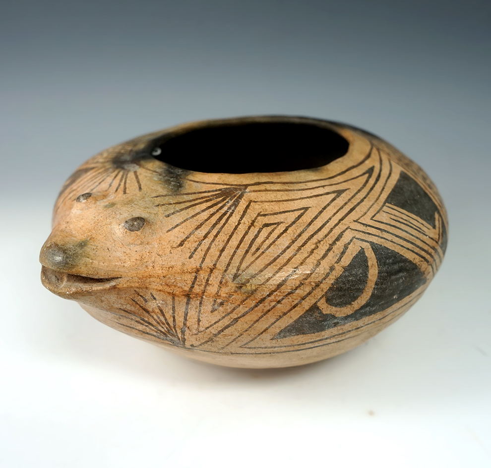 Well styled and nicely painted 7 1/4" Wide Effigy Jar.