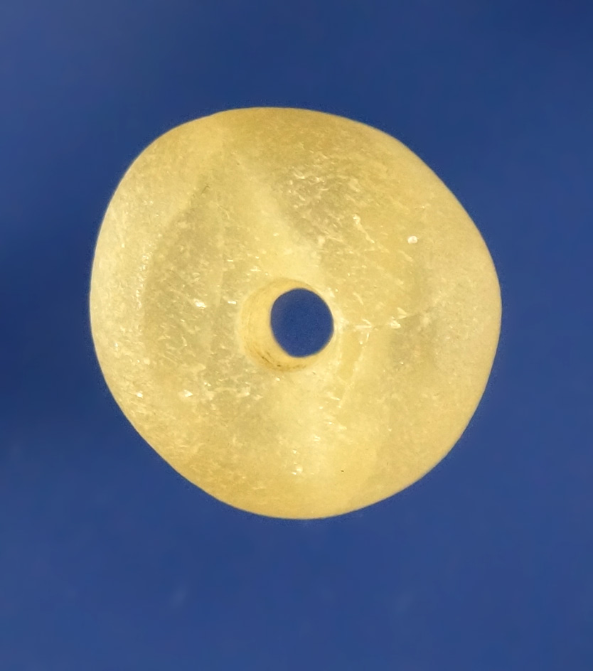 Nicely patinated 5/8" diameter drilled fluorite bead found at the Crib Mound in Spencer County India