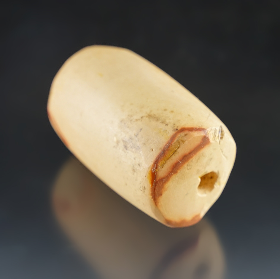 2 1/16" large stone bead found on a site in Colusa Co., California.