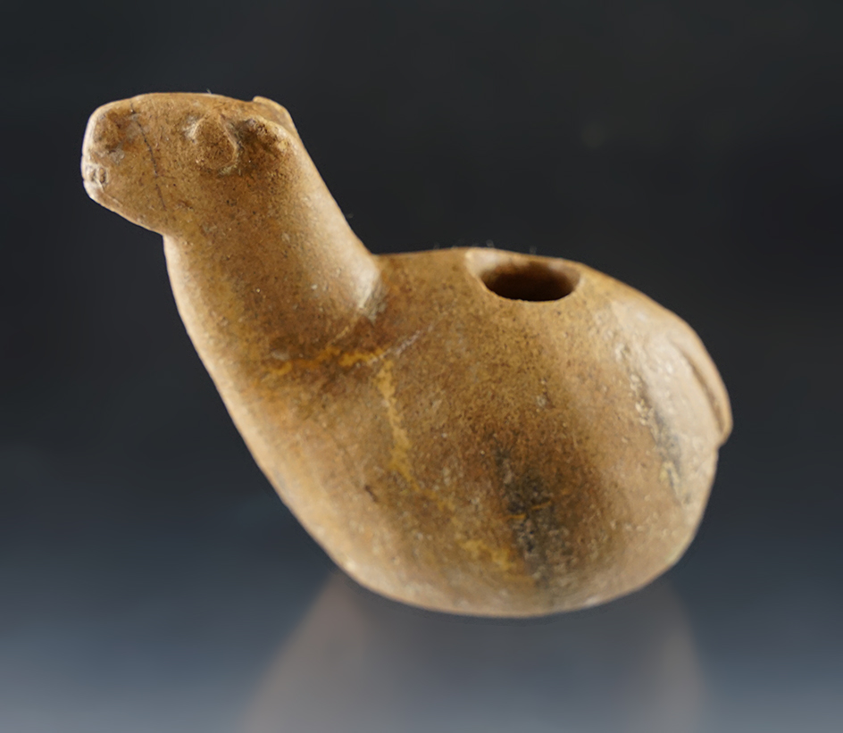 Fine 2 3/4" tall Llama Canopa. Broken and glued at the neck. Found in Peru.