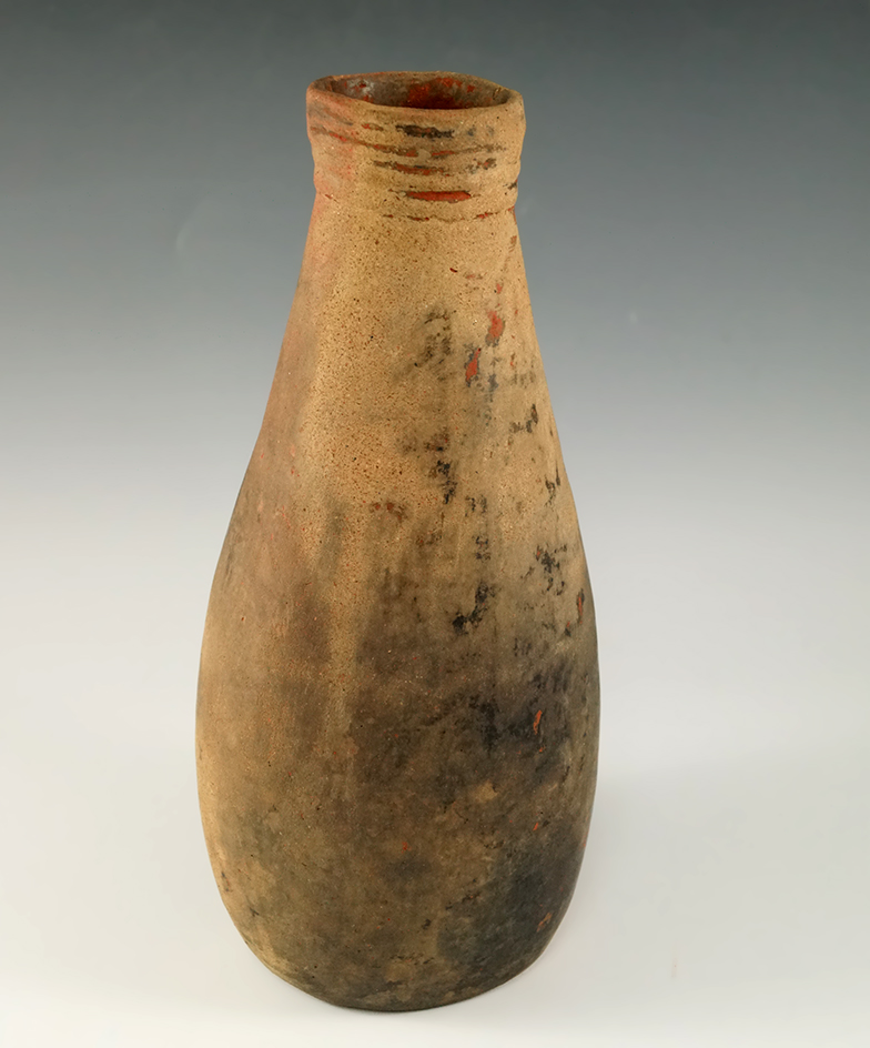 Uniquely styled 9" tall by 3 3/4" wide Caddo Cylinder Bottle (E. Texas) in solid condition.