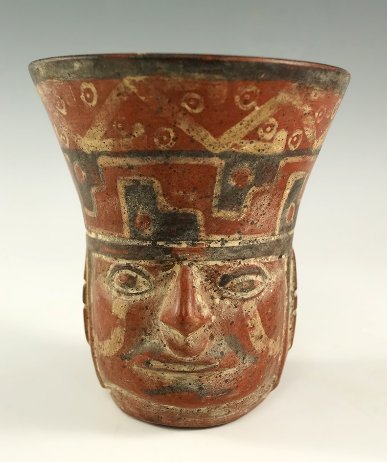 4" tall by 3 5/8" wide Wari culture Face Effigy Cup  that is nicely styled with good paint found in