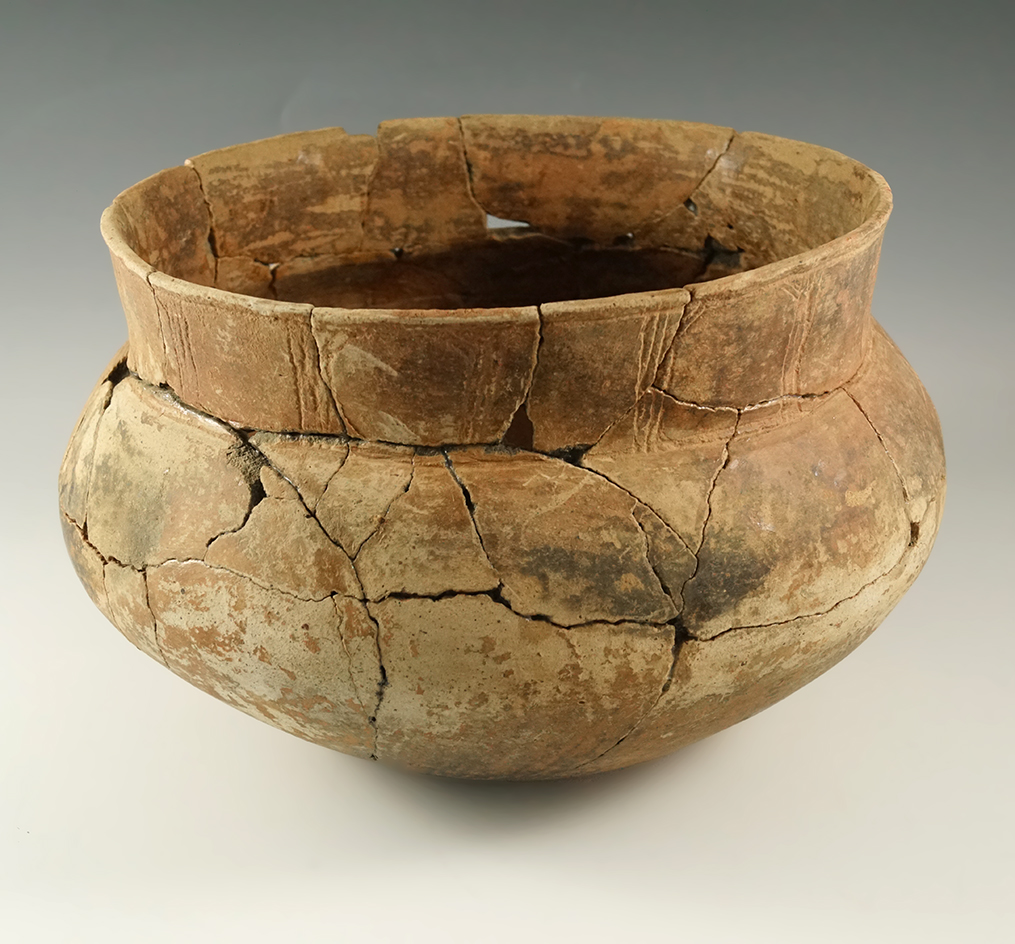 Very large! 10" wide by 6 3/4" tall Poynor Engraved jar (E. Texas) with many reassembled pieces.