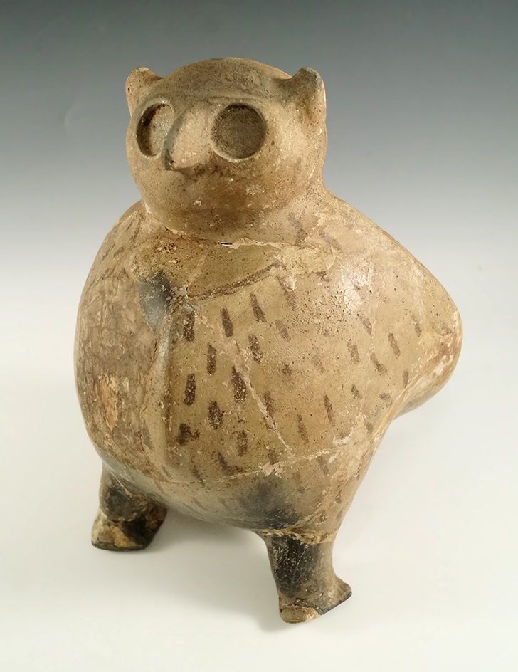 Very unique 8"  by 6 3/8" wide Hooded Owl Effigy Bottle with some restoration. Unknown origin.