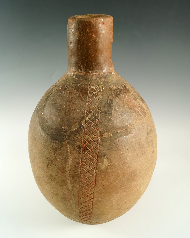 Large, 11 1/4" x 6 1/2" Hume Engraved Bottle (E. Texas) Some glued-back pieces/some restoration.