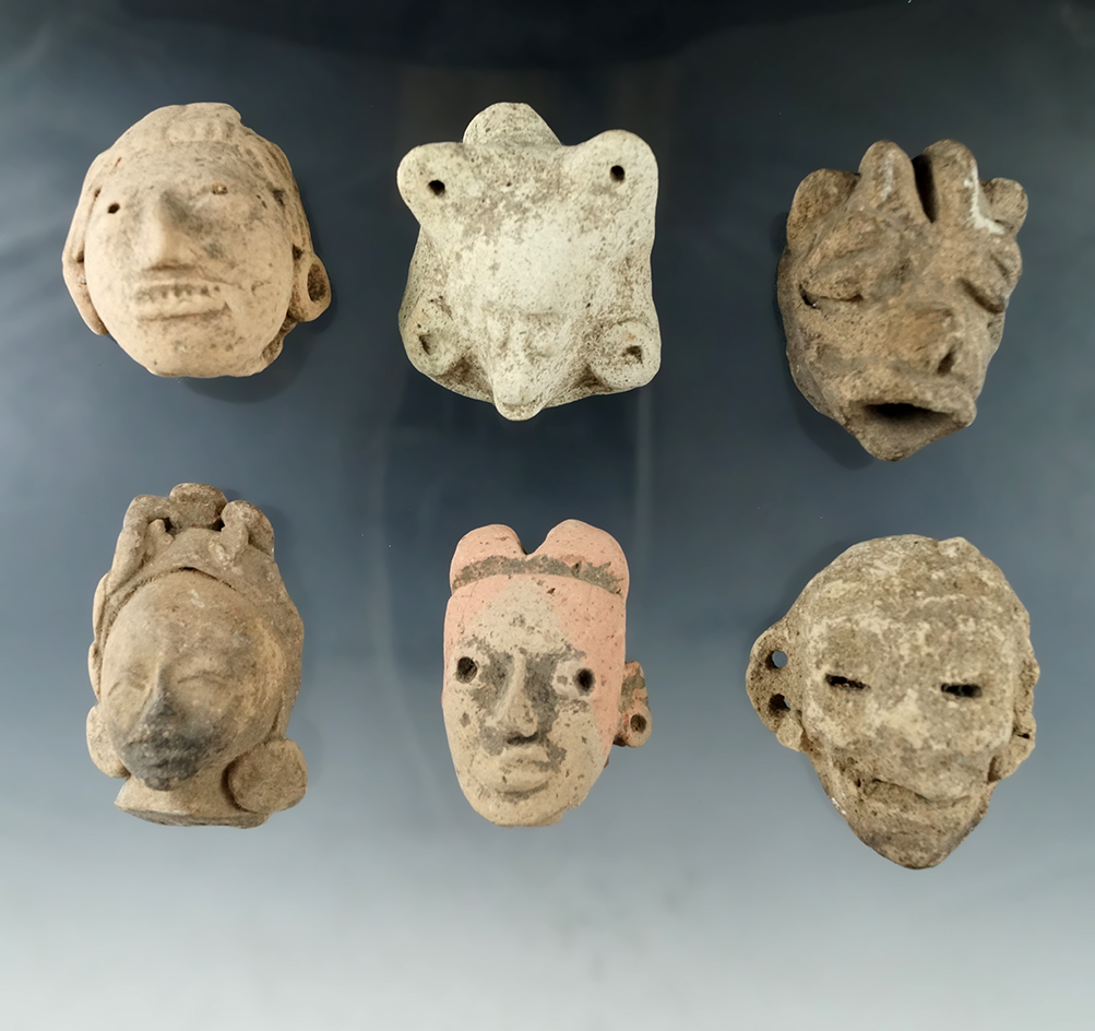 Set of six pre-Columbian pottery heads from Mexico, largest is 2".