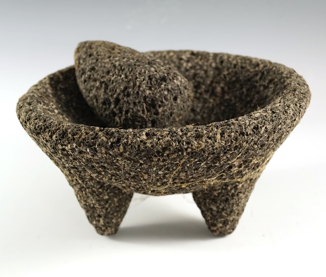7" wide by 3 1/2" tall tri-leg mortar and pestle made from lava stone - southwestern U. S. or Mexico