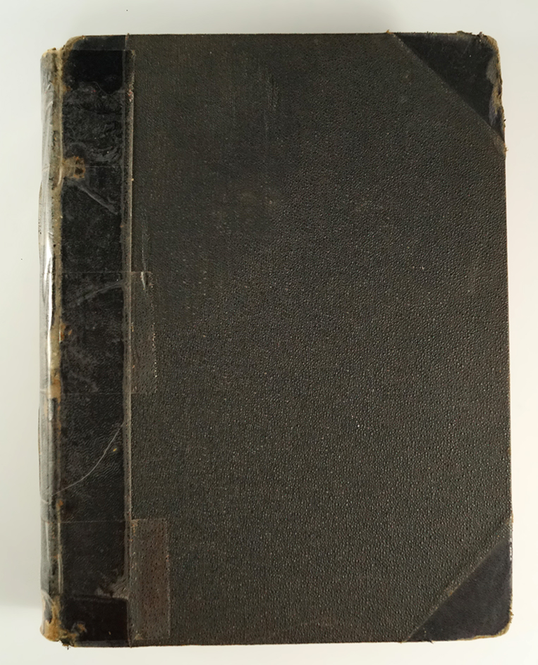 Hardbound book "The Antiquarian" first edition, published in 1897. The spine/cover are taped.