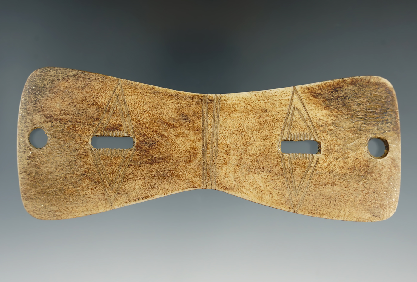 5 13/16" x 2 5/16" Snow Goggles made from Bone with incised design. Found in Alaska. COA.