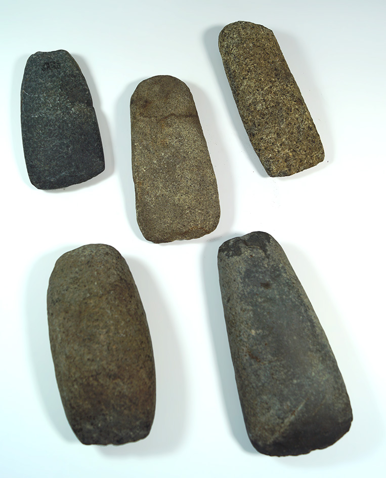 Set of five stone Celts, all have some minor damage but still great examples. Largest is 5".