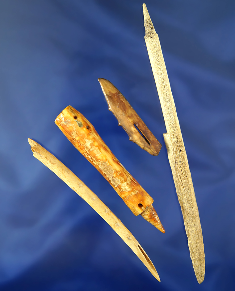 Set of four bone artifacts found in Alaska, largest is 6".