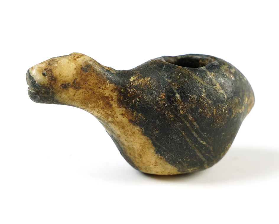 Well patinated 3 5/8" wide by 1 1/2" tall Llama Canopa found in Peru. 