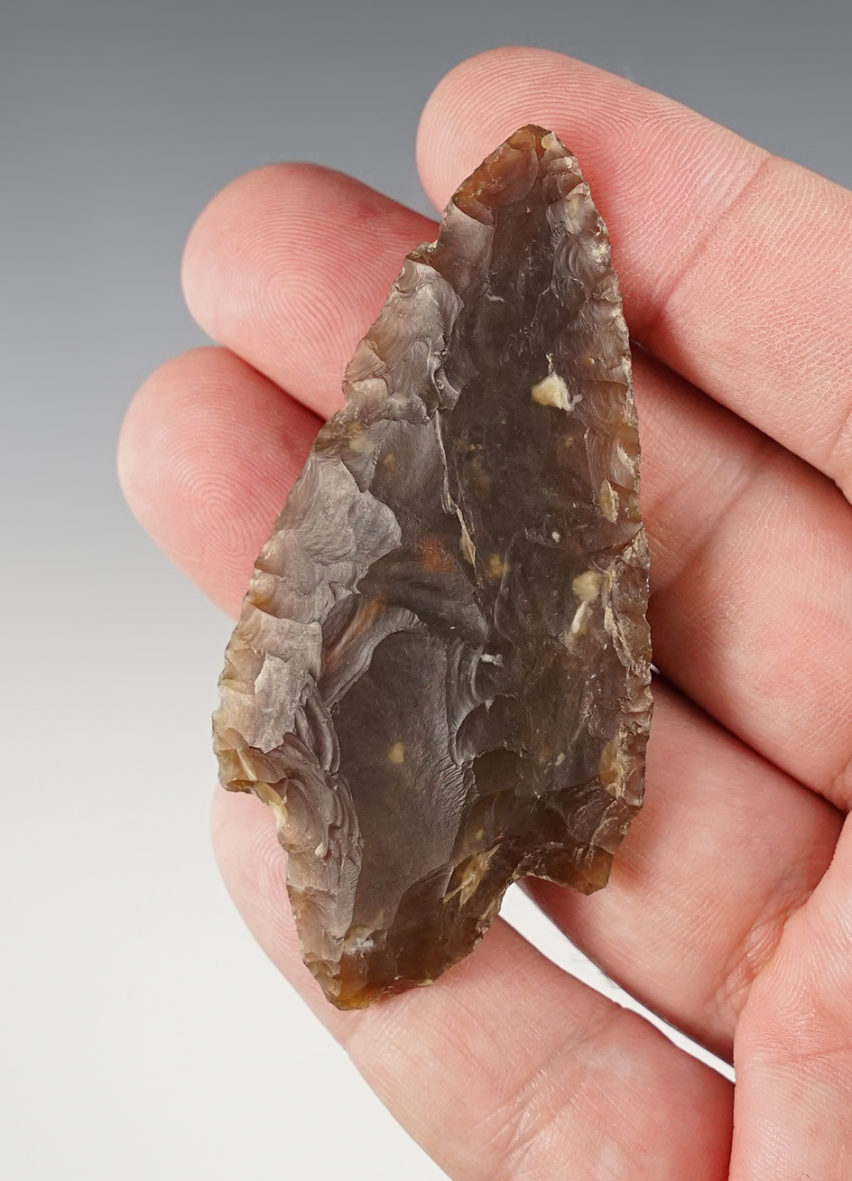 2 7/8" Dickson made from Knife River Flint. Found in Fulton Co., Illinois. Ex. Freeman Wilson.