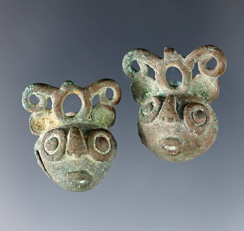 Pair of highly decorative Moche Culture Copper Bells found in Peru. Both are 15/16". 