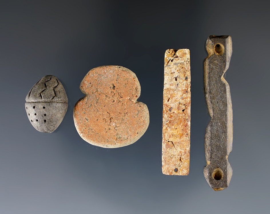 Nice set of four ornaments found in Arizona, largest is 1 7/8".