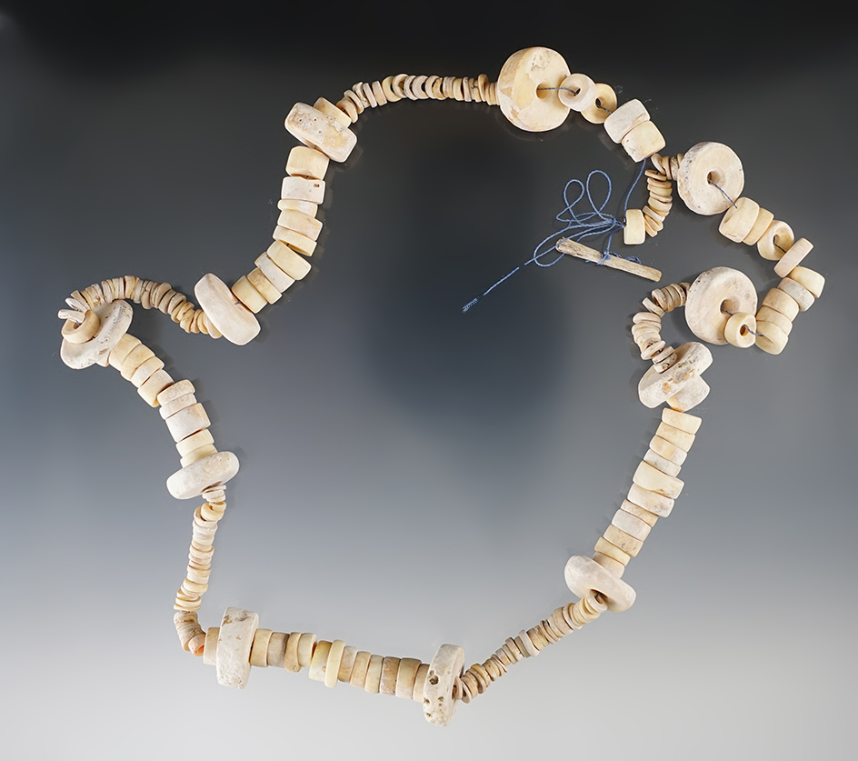 20" long strand of drilled shell beads in various sizes found in New Mexico.