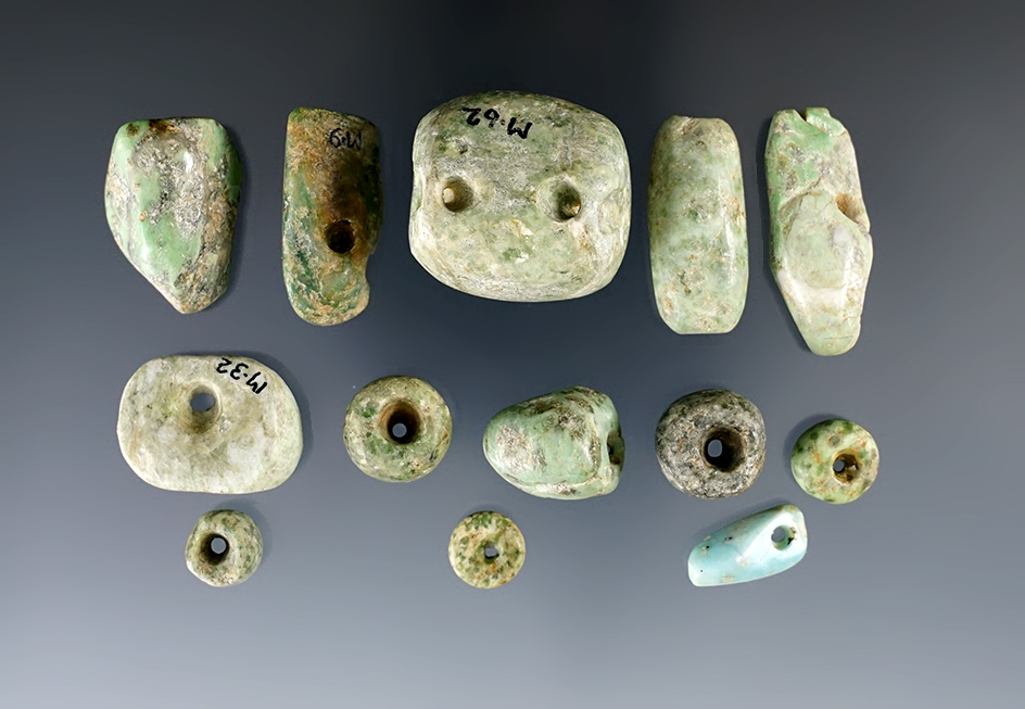 Set of 13 attractive drilled pre-Columbian beads found in Mexico. Largest is 1" wide.