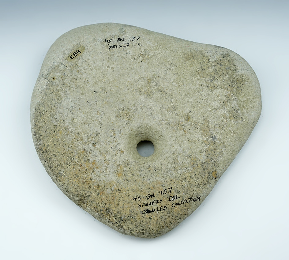 Large 7 5/8" drilled stone net weight found at Yeager's Island. Ex. Ernie Cowles collection.