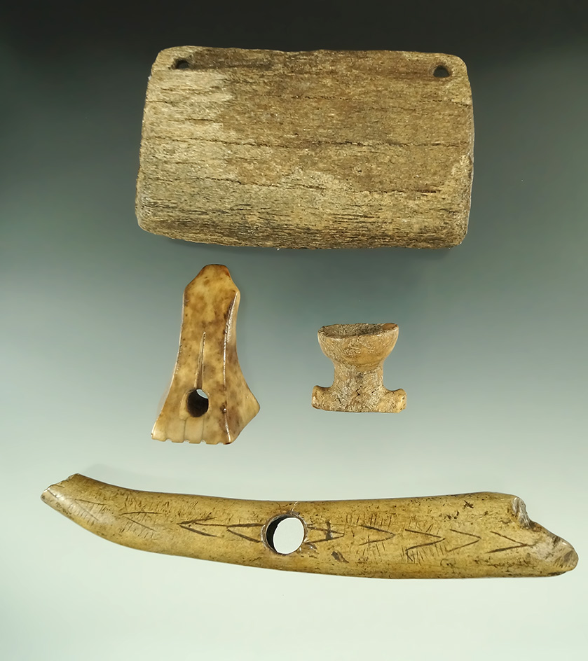 Group of assorted Alaskan artifacts, largest is 5 3/4".