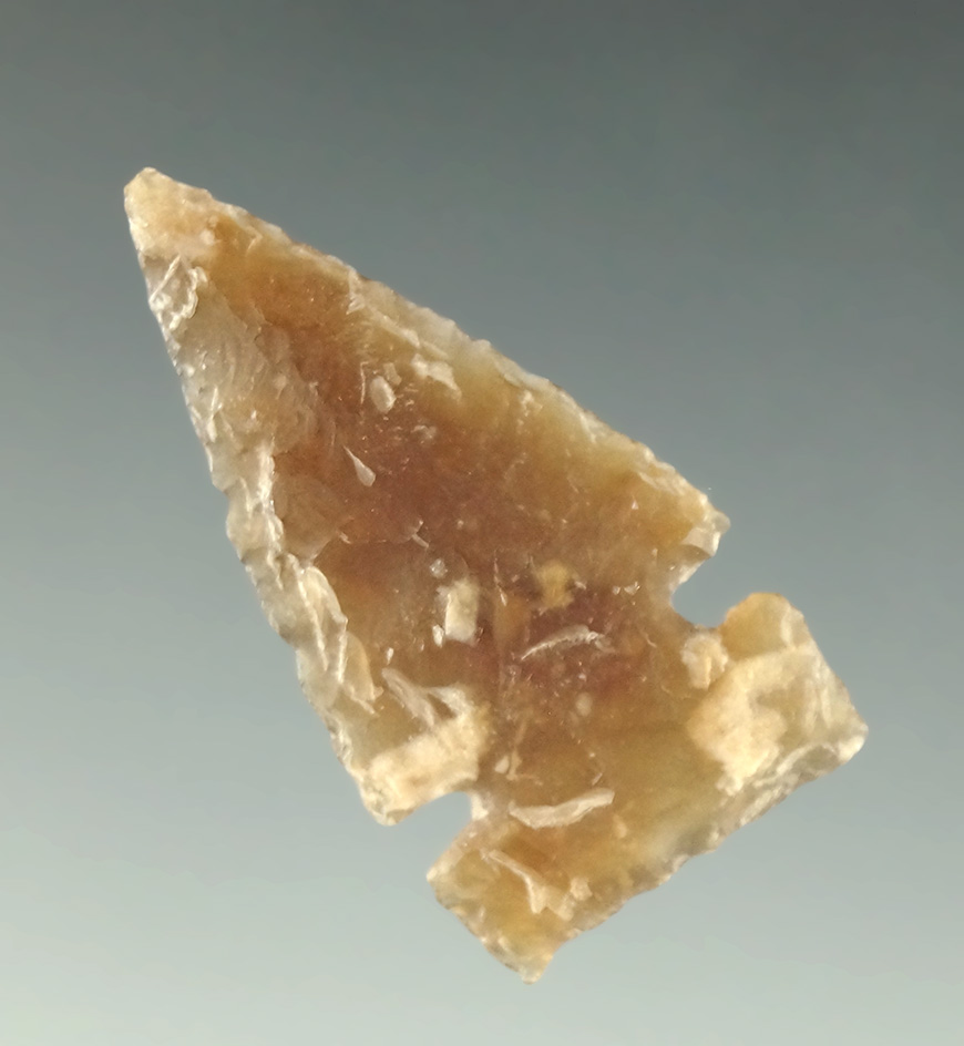 1 3/16" highly translucent Sidenotch that is nicely made off of a flake, found in the Dakotas.
