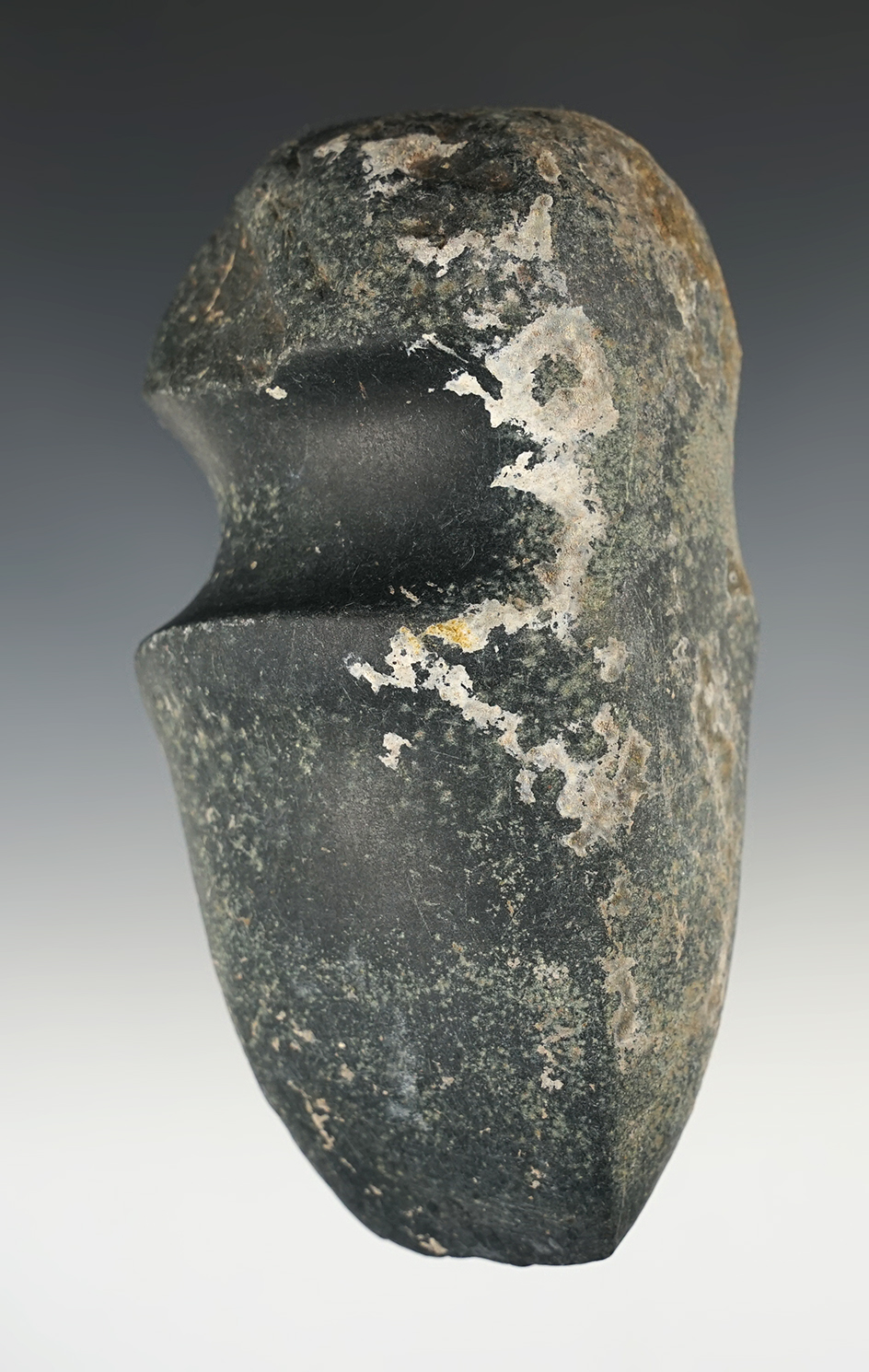 4 7/8" long 3/4 grooved heavily patinated Axe found in New Mexico.