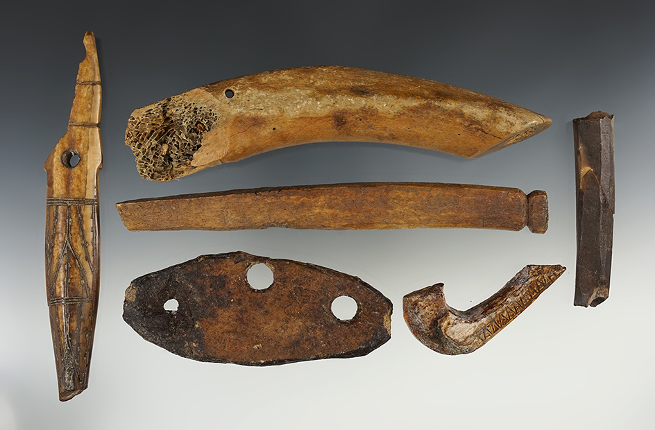 Set of six assorted bone and ivory artifacts found in Alaska, largest is 7".