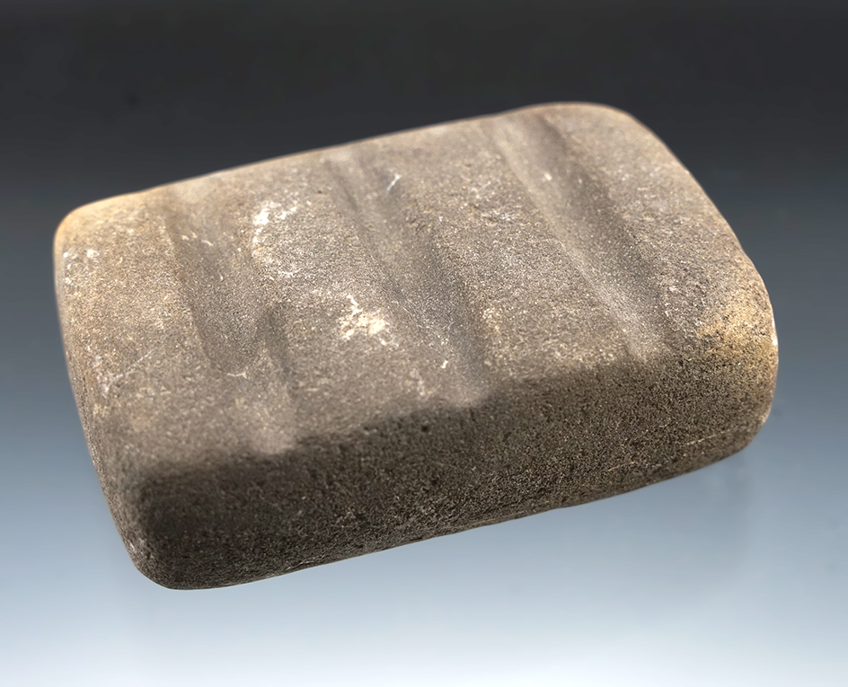 Excellent example of type! 3 9/16" triple grooved arrow shaft polisher found in New Mexico.