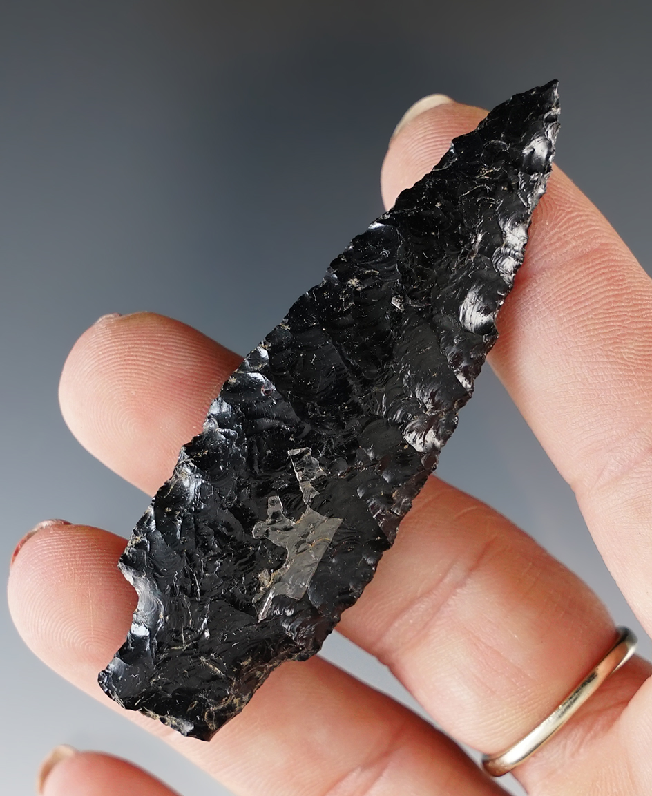 Excellent flaking on this 2 13/16" obsidian stemmed dart point found in New Mexico.