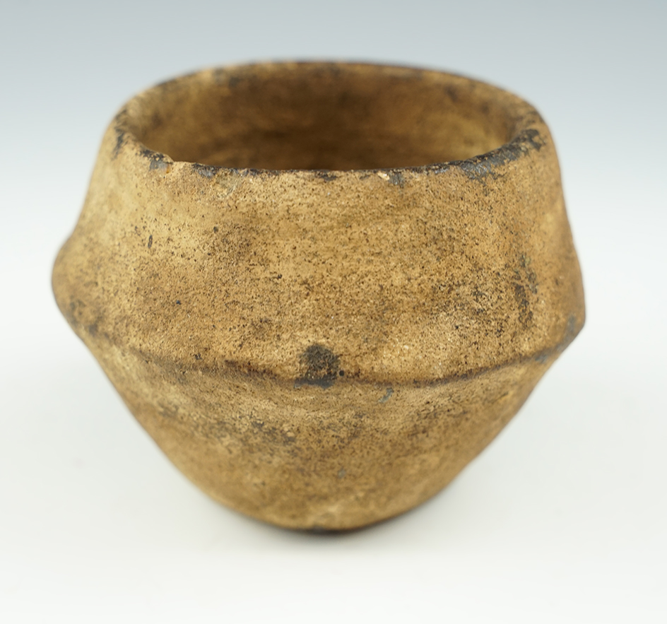 3 3/4" wide by 2 7/8" tall pre-Columbian pottery vessel recovered in Mesoamerica.