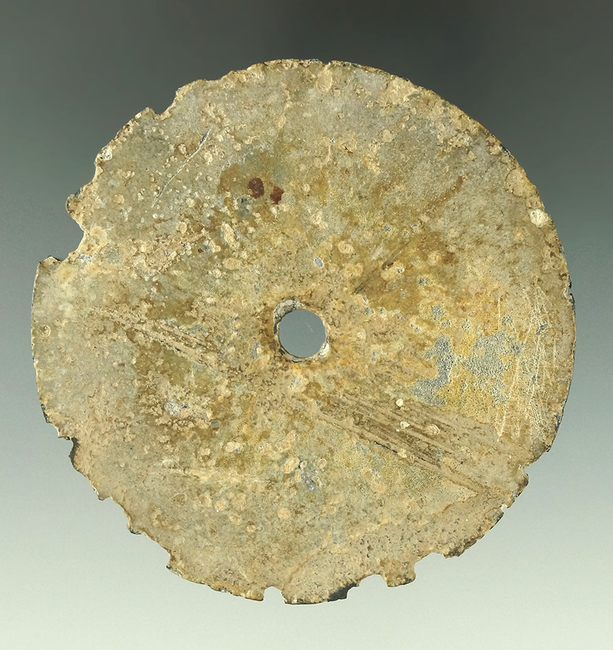 Uniquely styled 3 1/8" ear ornament/ear Spool found in Leflore Co., Oklahoma.