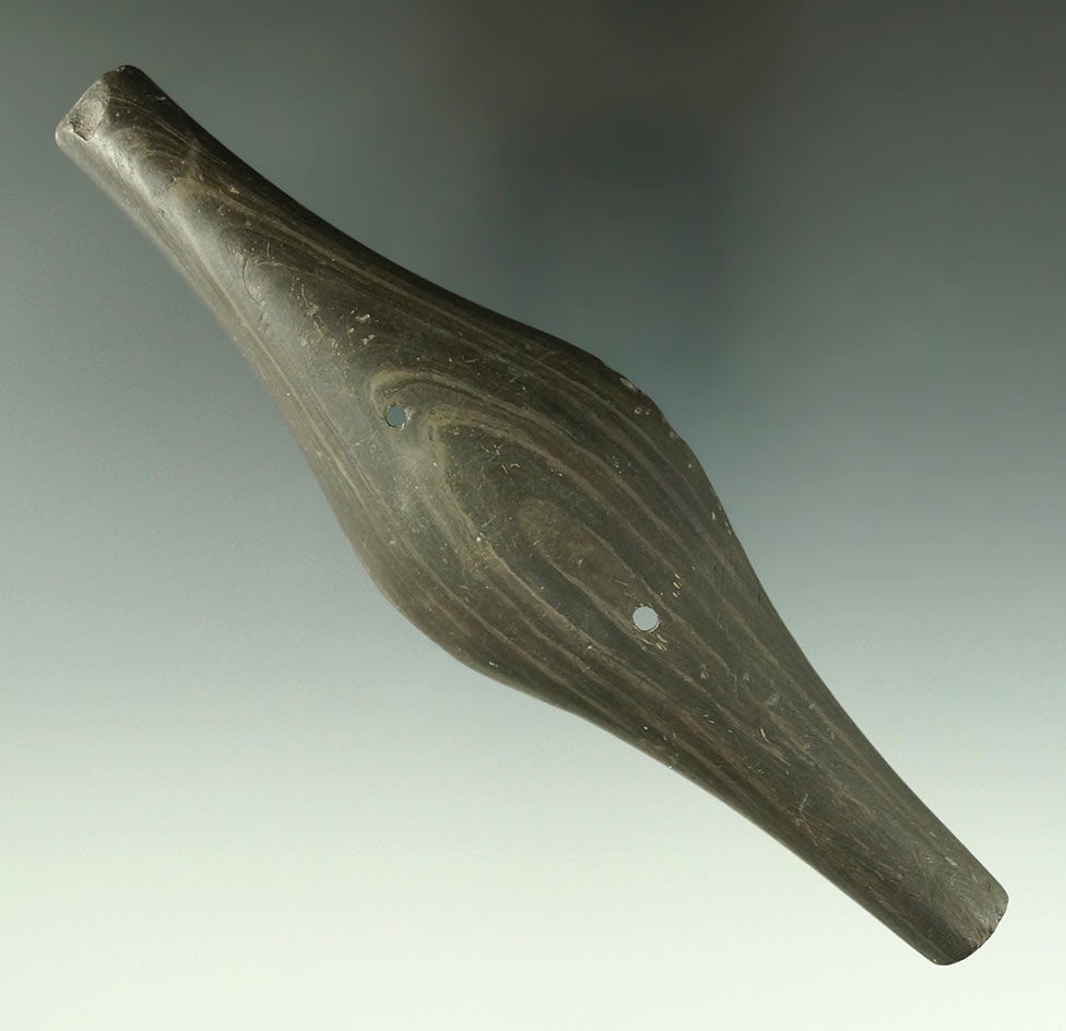 6 1/16" Adena Expanded Center Gorget  that is one half restored. Found in Union Co., Ohio.