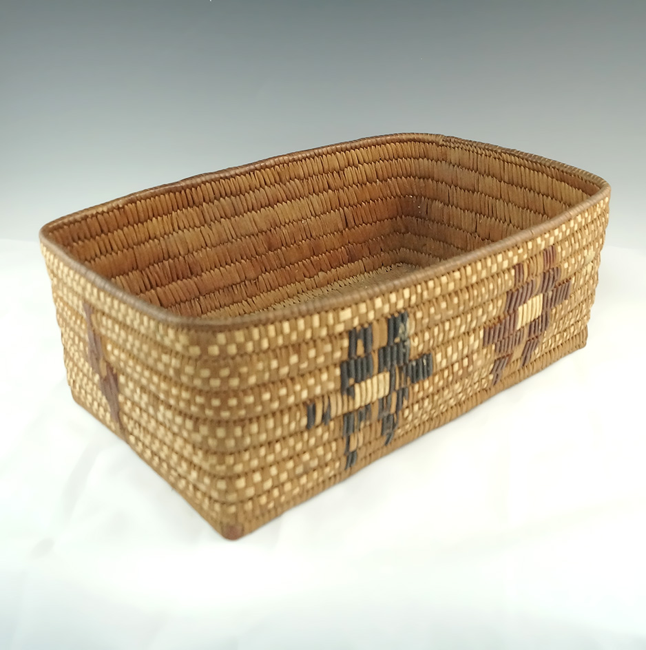 Beautifully woven contemporary Indian basket, which is 9" by 13" in excellent condition.