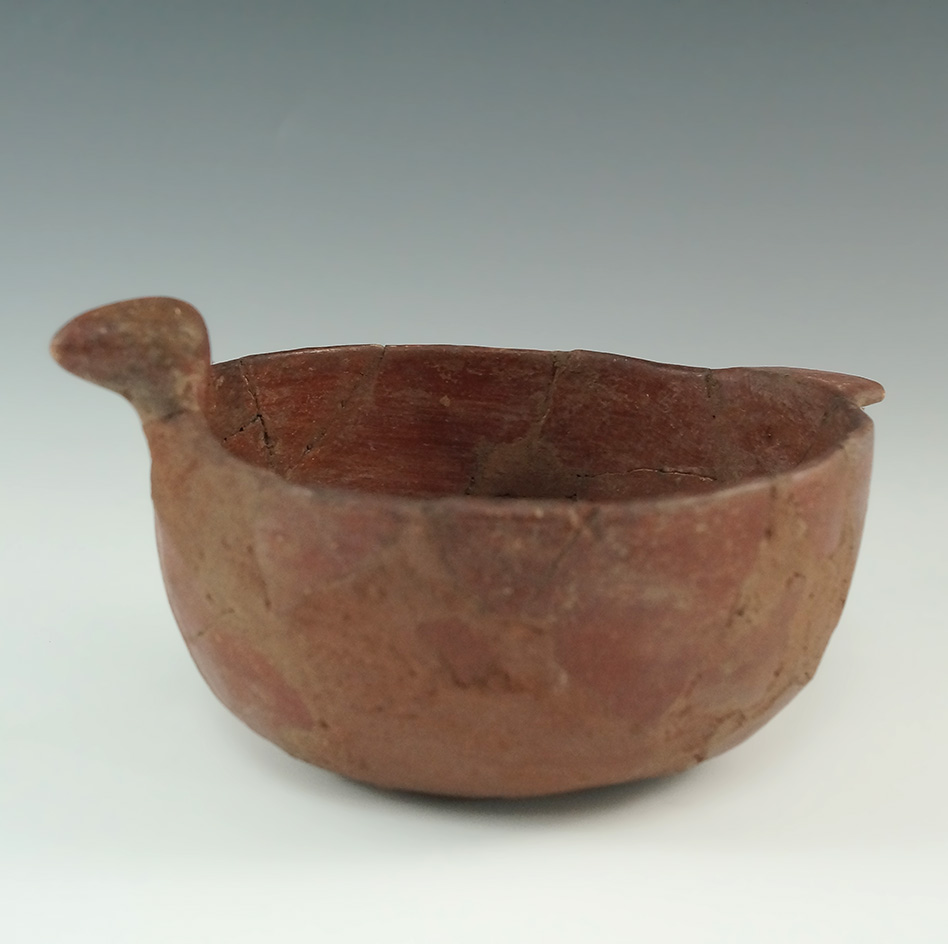Heavily restored 7 1/2" red Clay bird effigy bowl from the Monroe Mechling collection.