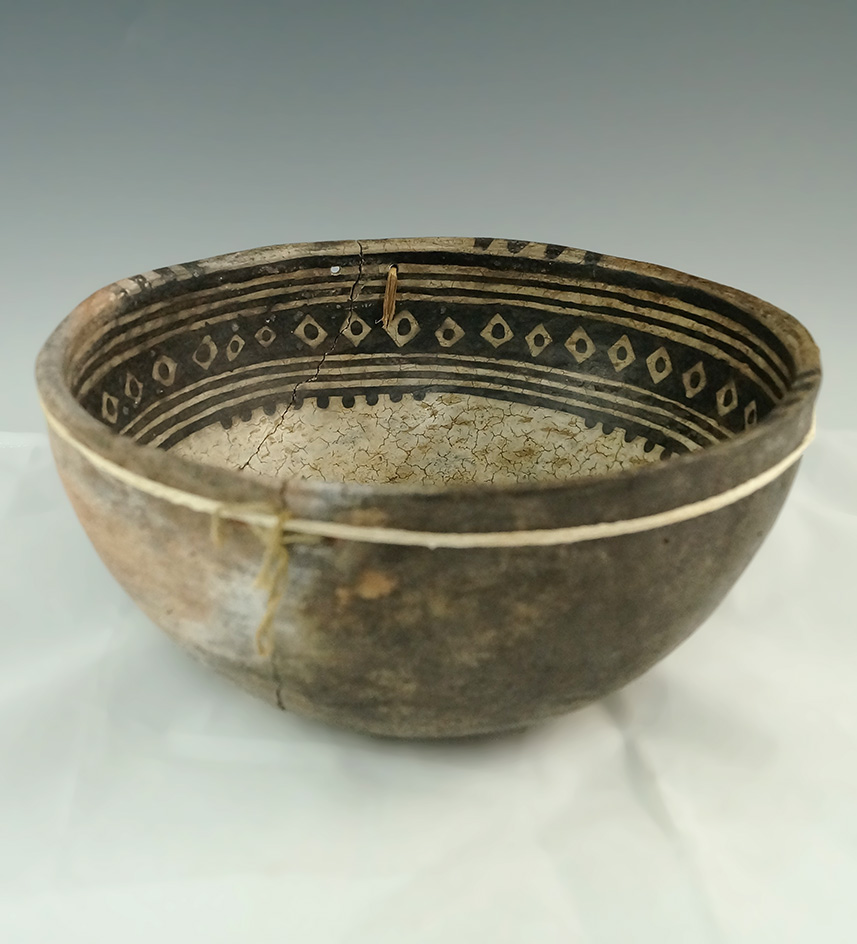 7 3/8" diameter Anastasi bowl found in Utah with the original plan fiber woven base.