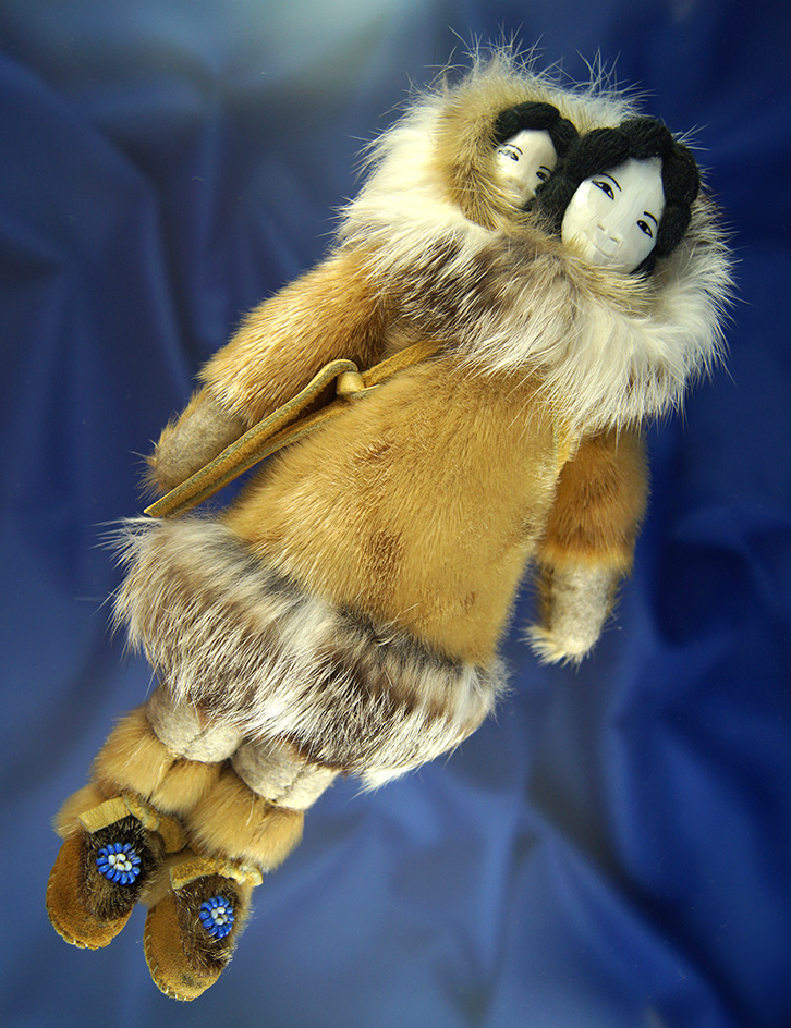 9" tall mother and child Inuit doll from Alaska. Yarn hair with otter fur hood and Parka. Rabbit fur