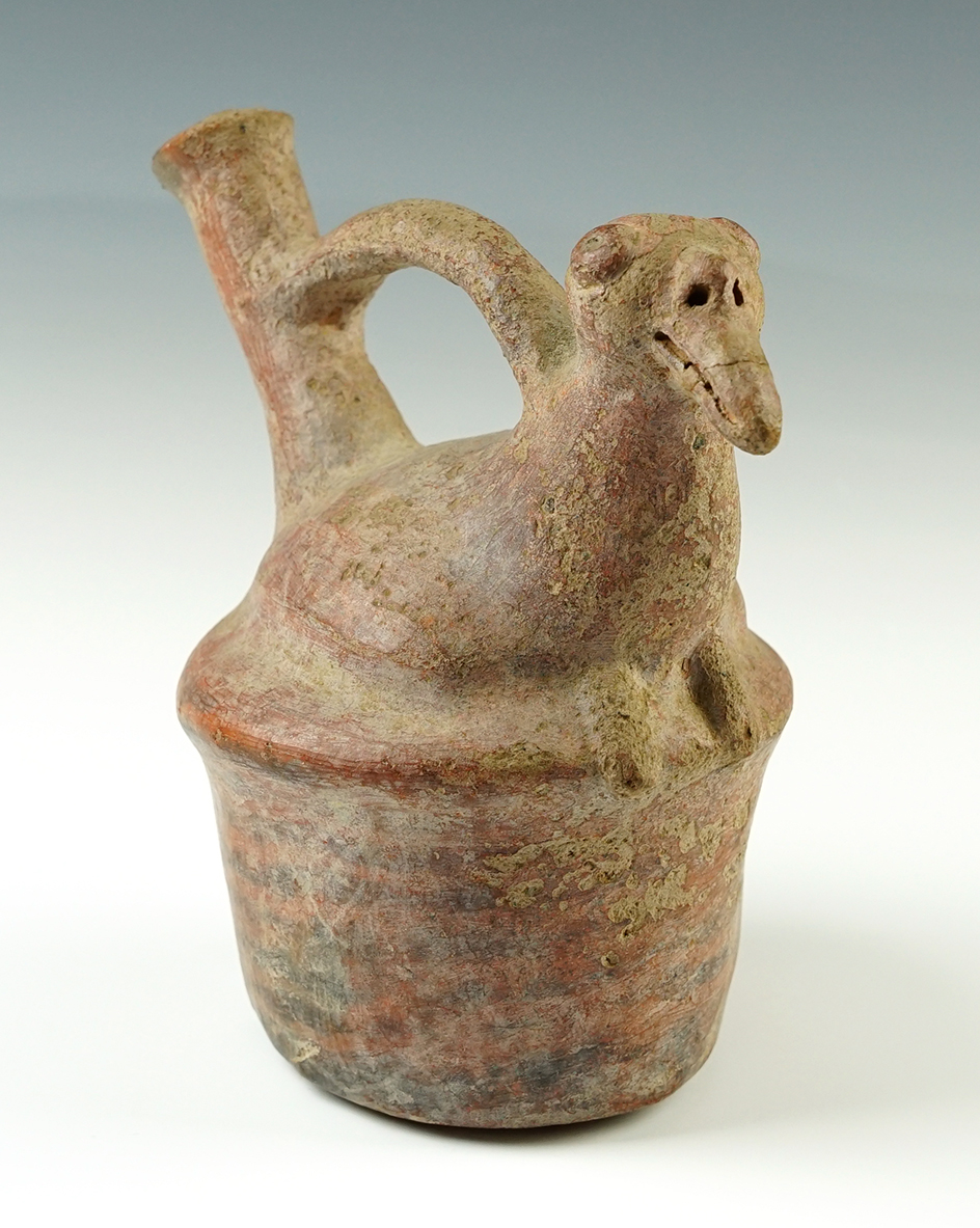 6 1/4" tall Ecuador Narino Strap Handle Effigy pottery bottle. Beak is broken and glued.
