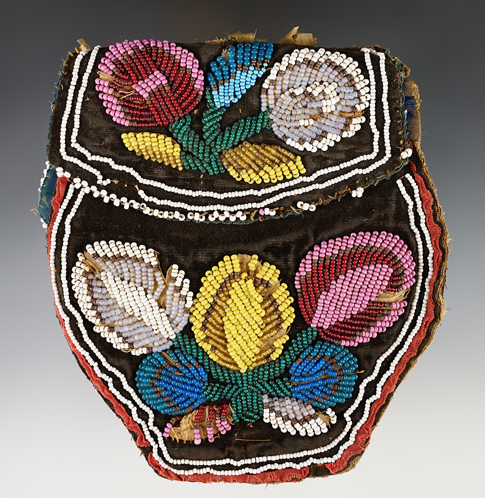 5 3/4" tall floral design beaded vintage purse. Great Lakes Region. Some bead loss .