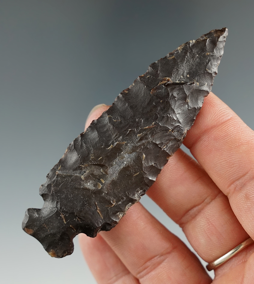 3 3/16" Archaic Sidenotch with nicely ground-based found in Eastern South Dakota.