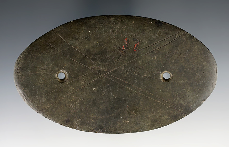 4  7/8" Oval Gorget with an "X" and other engravings on both sides and tallies on two edges.