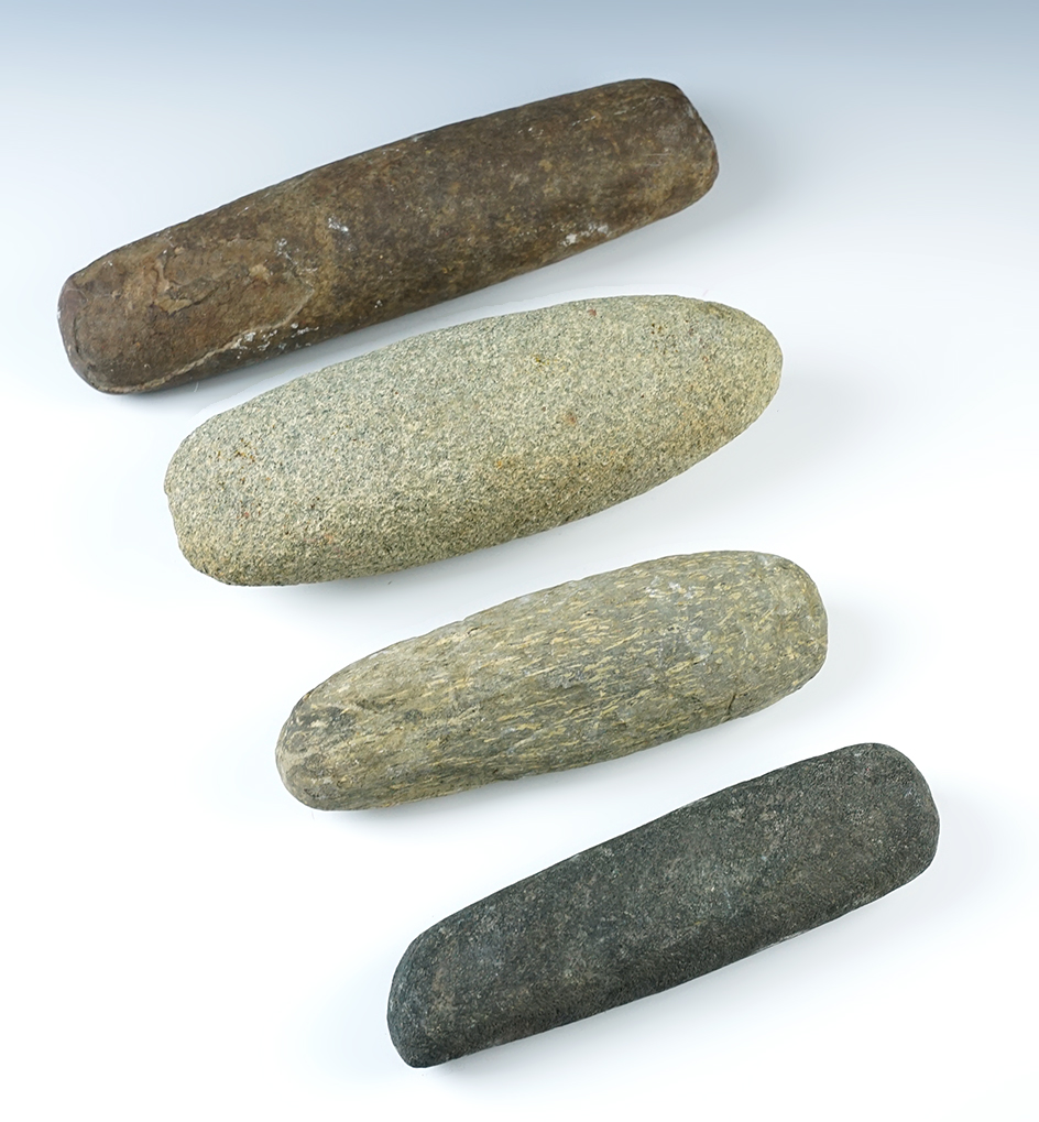 Set of four Midwestern Stone Tools including three Roller Pestles and a Preform. Largest is 10".