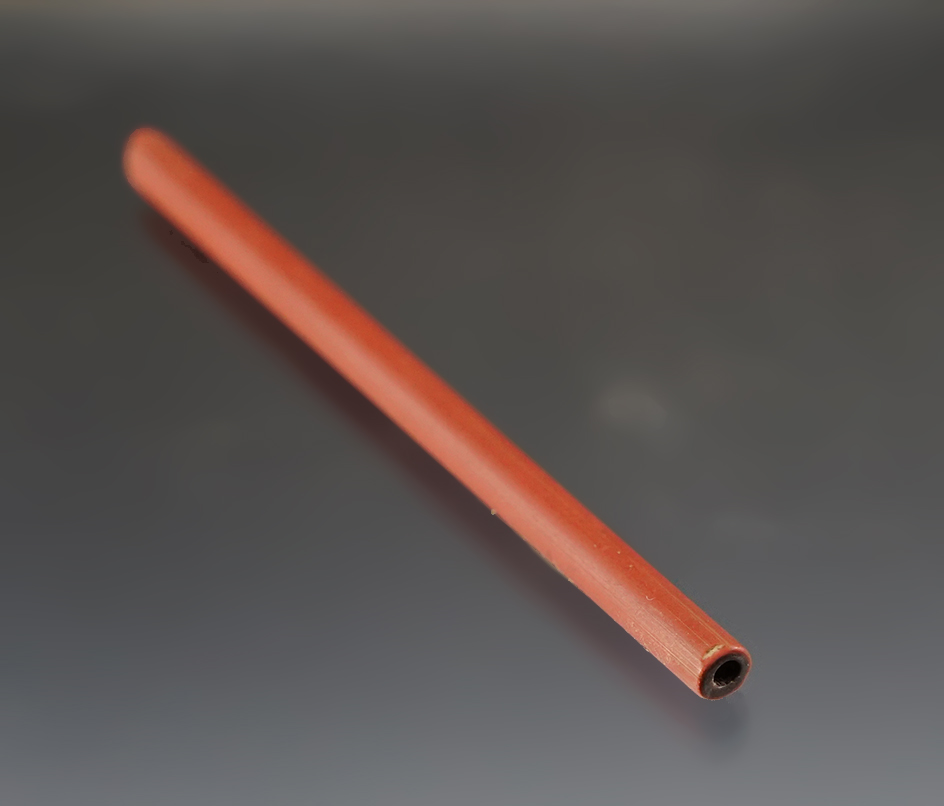 3 1/2" red Tubular Straw Bead in very nice condition. Townley Reed site, Geneva New York.